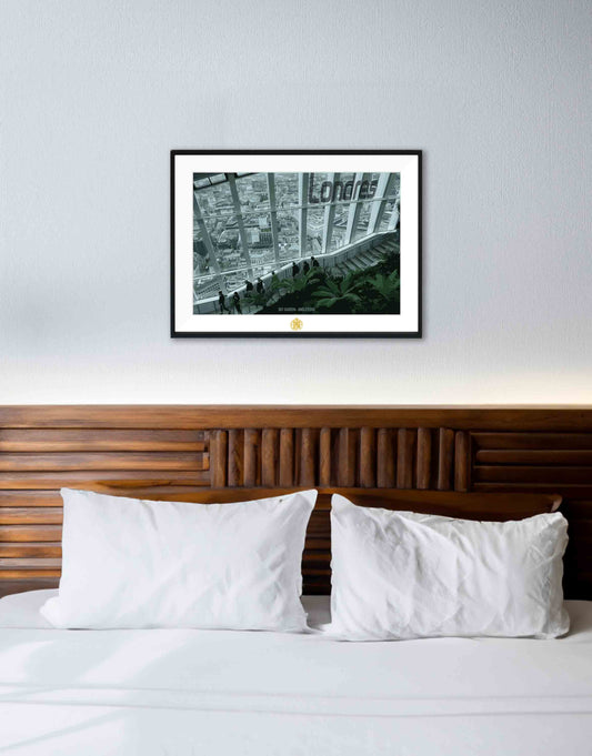 cadre murale au dessus d'un lit représentant d'une photo haut du sky garden de Londres